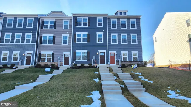 a view of a building with a yard
