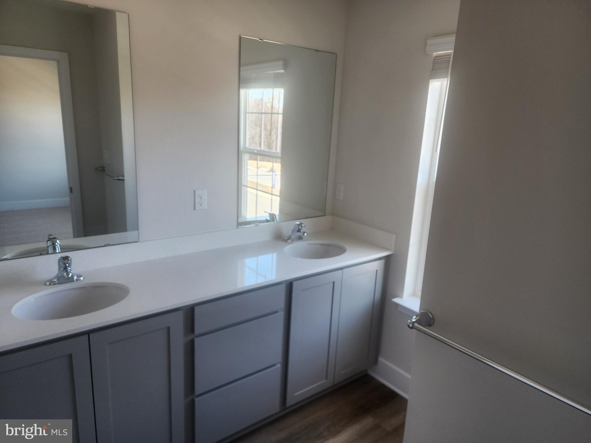 231 Joppa Farm Road Joppa, MD 21085 - Photo 13 of 25 a bathroom with a sink and a mirror