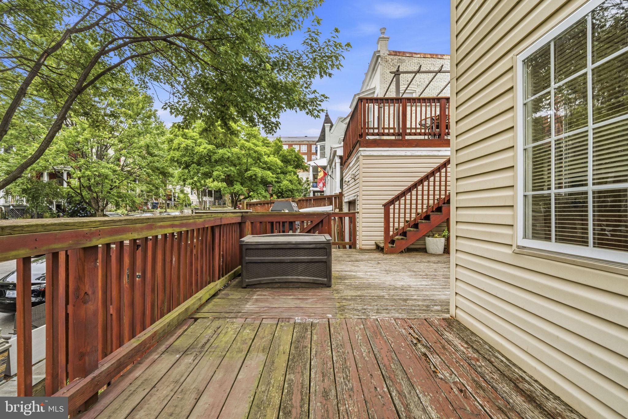 1824 3rd Street Northeast Washington, DC 20002 - Photo 28 of 30 Charming deck with lush greenery.