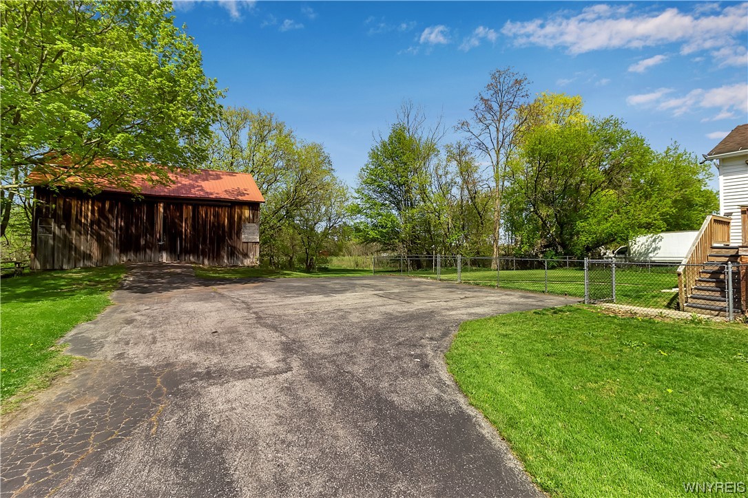 9331 Ridge Road Hartland, NY 14105 - Photo 3 of 39 Huge blacktop driveway.
