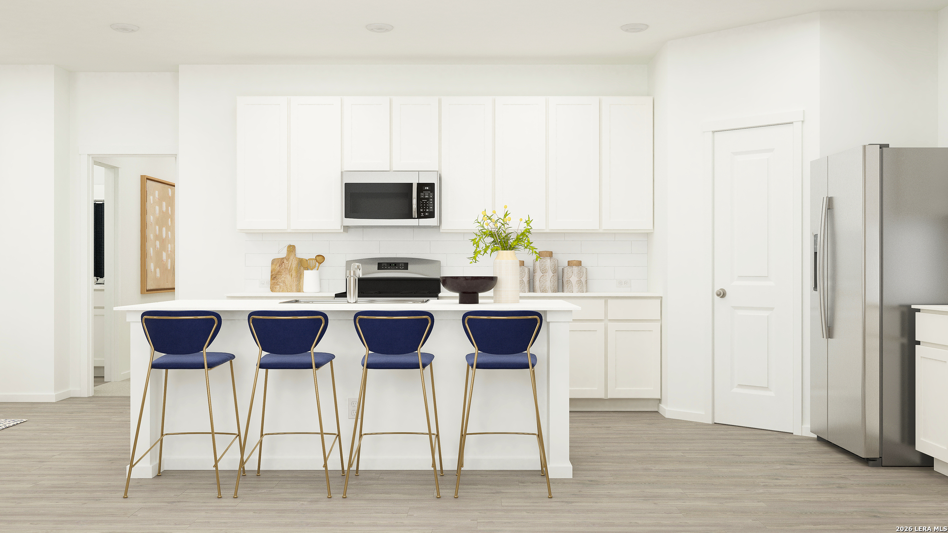 128 Rawhide Ridge Pleasanton, TX 78064 - Photo 18 of 38 a kitchen with a dining table chairs and white appliances