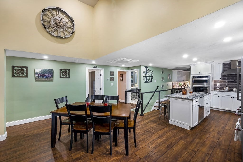 8 New Spencer Road Charlton, MA 01507 - Photo 11 of 42 a view of a dining room with furniture and wooden floor