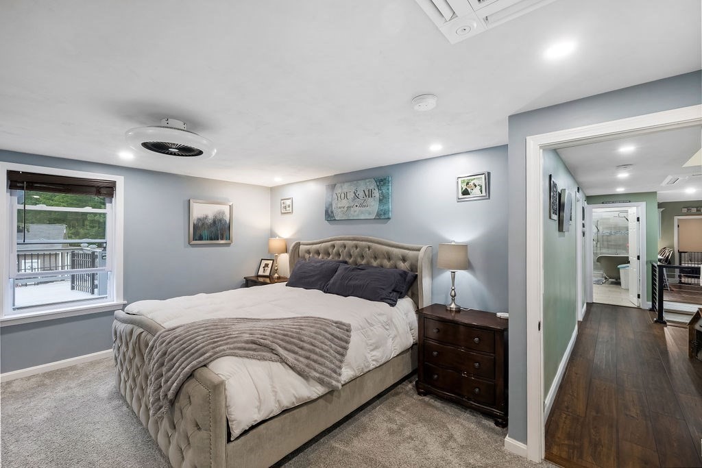 8 New Spencer Road Charlton, MA 01507 - Photo 13 of 42 a bedroom with a bed and a large window