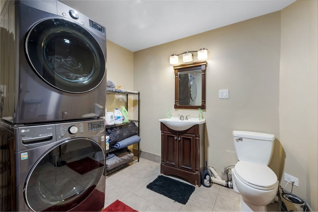 8 New Spencer Road Charlton, MA 01507 - Photo 17 of 42 a bathroom with a toilet sink and mirror