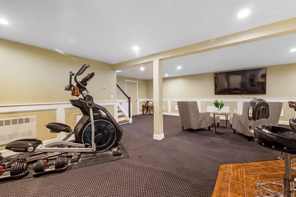 8 New Spencer Road Charlton, MA 01507 - Photo 19 of 42 a view of a room with gym equipment