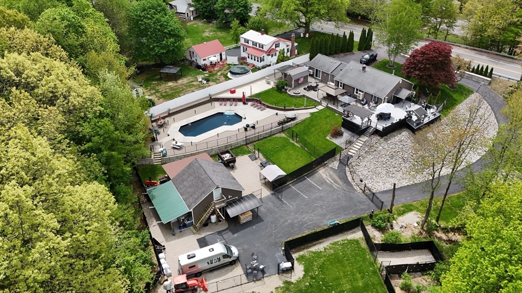 8 New Spencer Road Charlton, MA 01507 - Photo 23 of 42 an aerial view of a house with a garden
