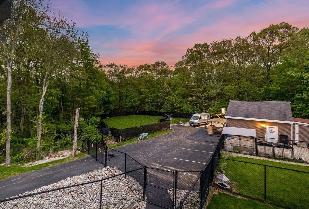 8 New Spencer Road Charlton, MA 01507 - Photo 24 of 42 a house view with a sitting space and garden