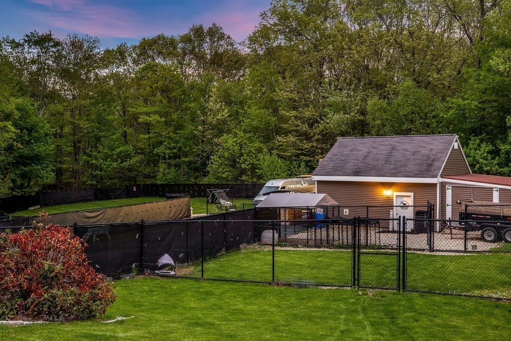 8 New Spencer Road Charlton, MA 01507 - Photo 25 of 42 a view of house with backyard and a hammock