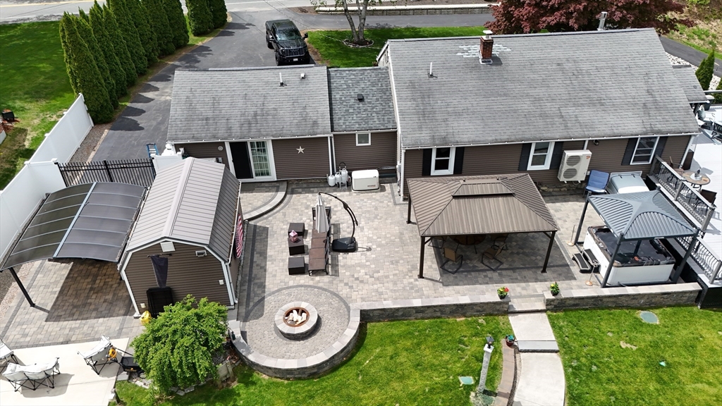 8 New Spencer Road Charlton, MA 01507 - Photo 28 of 42 an aerial view of a house with swimming pool and big yard