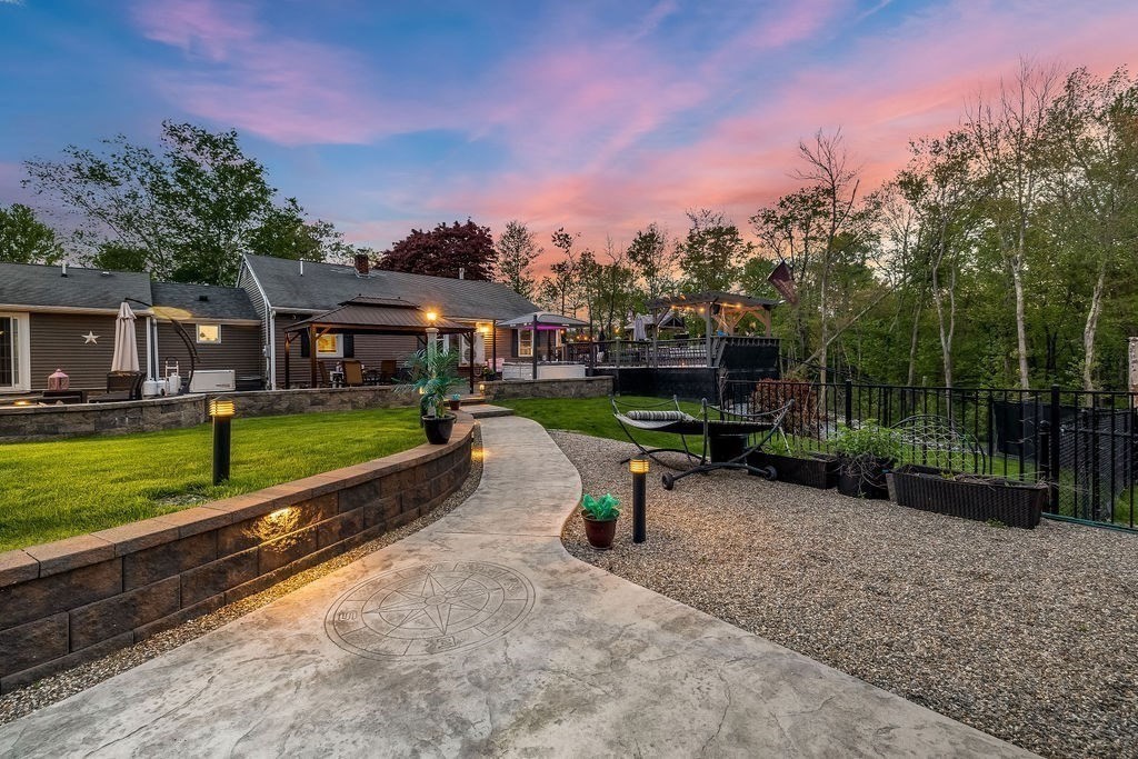 8 New Spencer Road Charlton, MA 01507 - Photo 31 of 42 a view of a house with a yard and sitting area