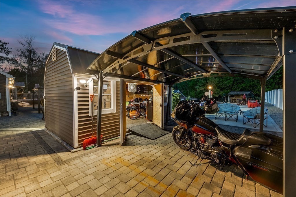 8 New Spencer Road Charlton, MA 01507 - Photo 38 of 42 a view of a storage room with wooden walls