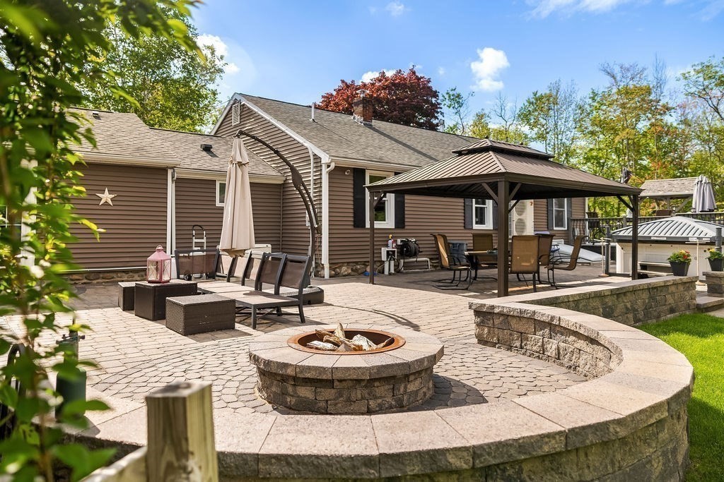 8 New Spencer Road Charlton, MA 01507 - Photo 39 of 42 a view of a house with swimming pool and porch