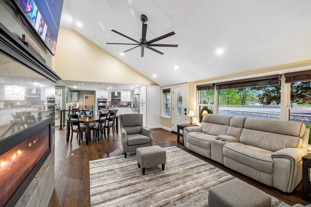 8 New Spencer Road Charlton, MA 01507 - Photo 4 of 42 a living room with furniture and a large window