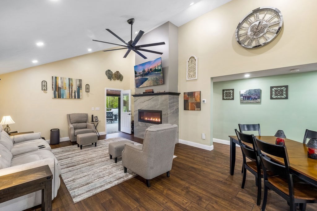 8 New Spencer Road Charlton, MA 01507 - Photo 5 of 42 a living room with furniture and a wooden floor