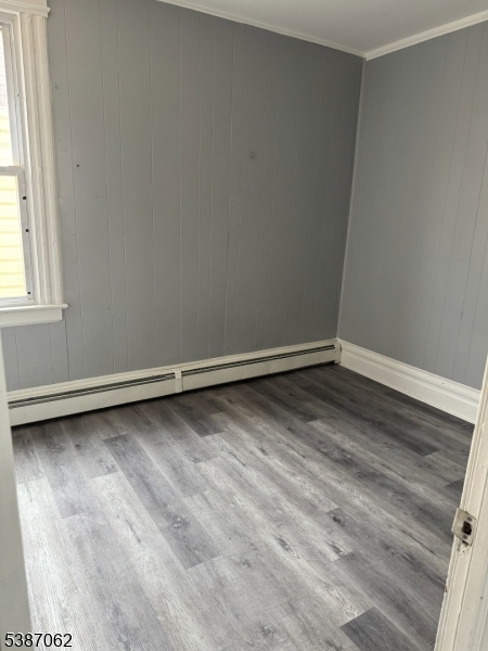 31 Tappan Street, Unit 1 Kearny, NJ 07032 - Photo 7 of 9 a view of a room with wooden floor