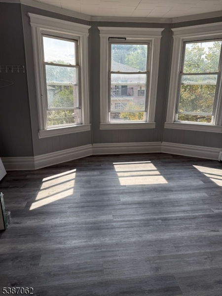 31 Tappan Street, Unit 1 Kearny, NJ 07032 - Photo 8 of 9 a view of empty room with wooden floor and fan
