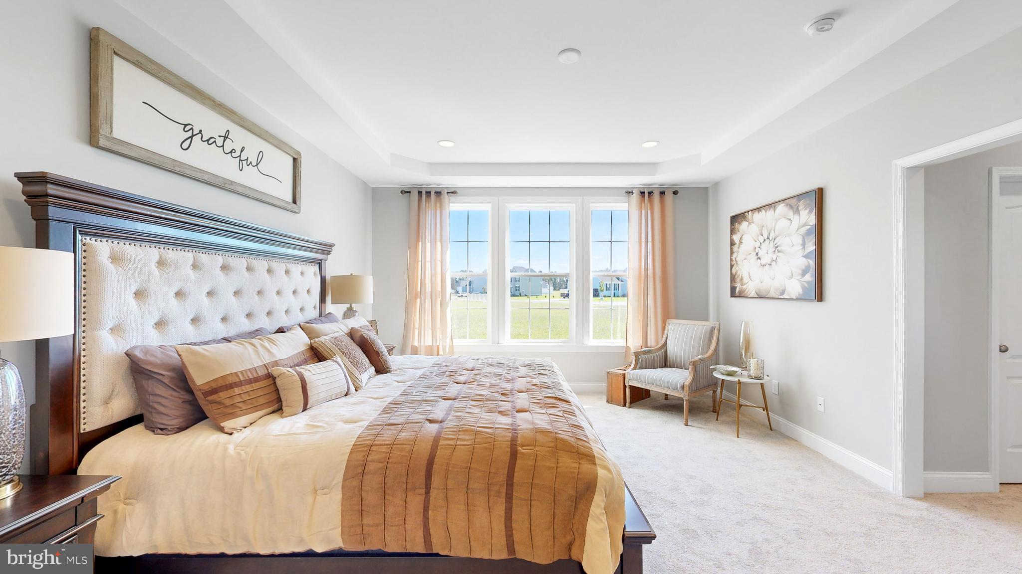 3 Mt Joy Road Millsboro, DE 19966 - Photo 21 of 43 a bedroom with a large bed and a window