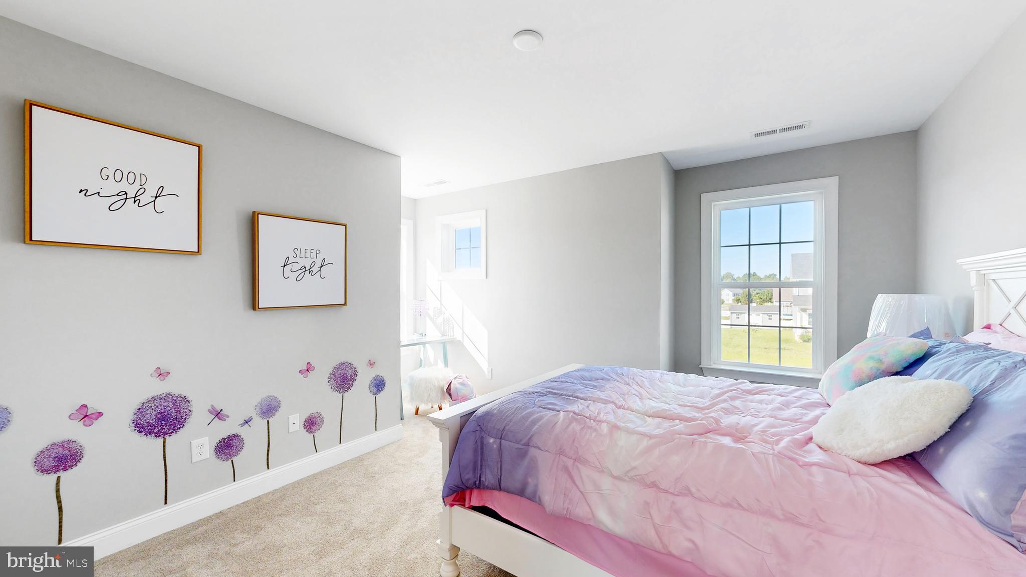 3 Mt Joy Road Millsboro, DE 19966 - Photo 22 of 43 a bedroom with a bed and a window