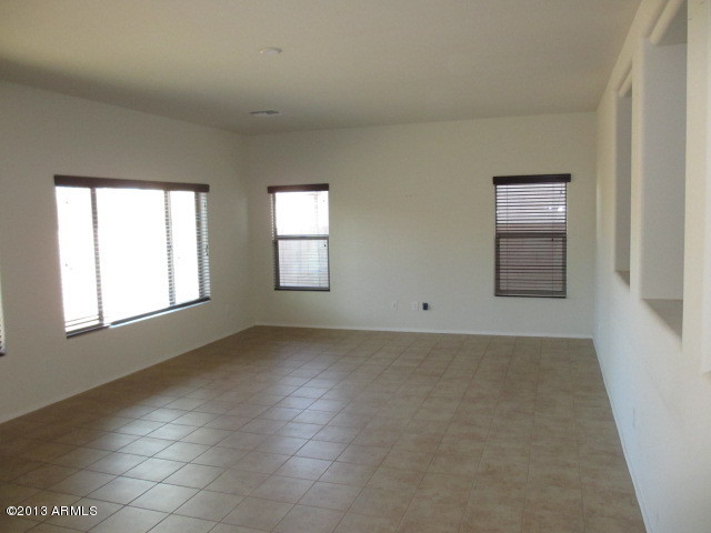 43500 West Magnolia Road Maricopa, AZ 85138 - Photo 12 of 35 an empty room with windows