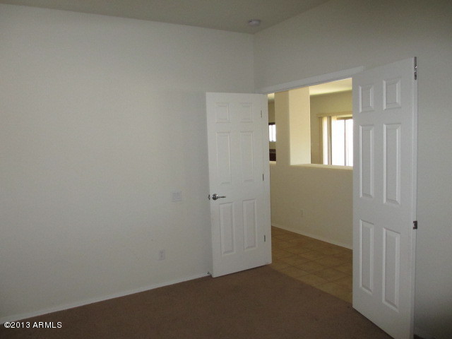 43500 West Magnolia Road Maricopa, AZ 85138 - Photo 13 of 35 an empty room with windows