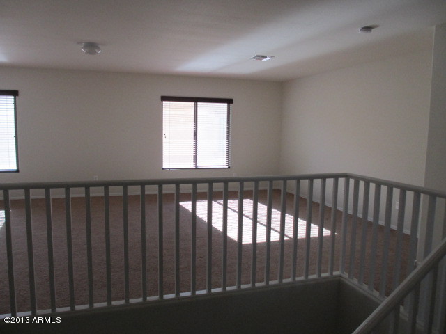 43500 West Magnolia Road Maricopa, AZ 85138 - Photo 18 of 35 a view of a hallway