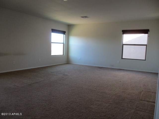 43500 West Magnolia Road Maricopa, AZ 85138 - Photo 19 of 35 an empty room with a window