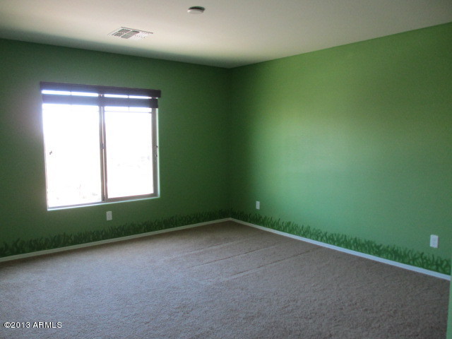 43500 West Magnolia Road Maricopa, AZ 85138 - Photo 26 of 35 an empty room with a window