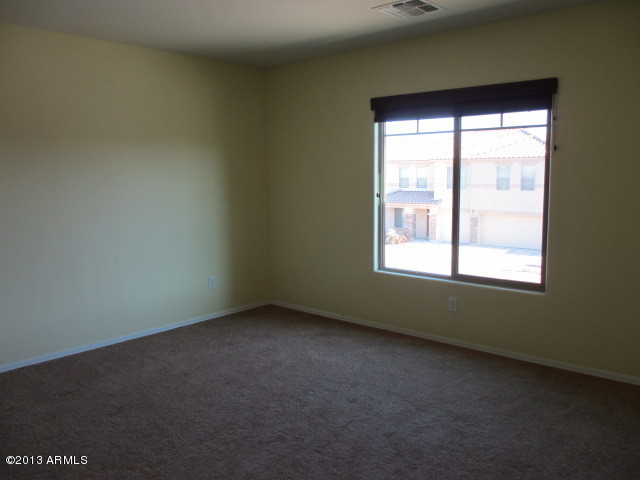 43500 West Magnolia Road Maricopa, AZ 85138 - Photo 28 of 35 an empty room with a window