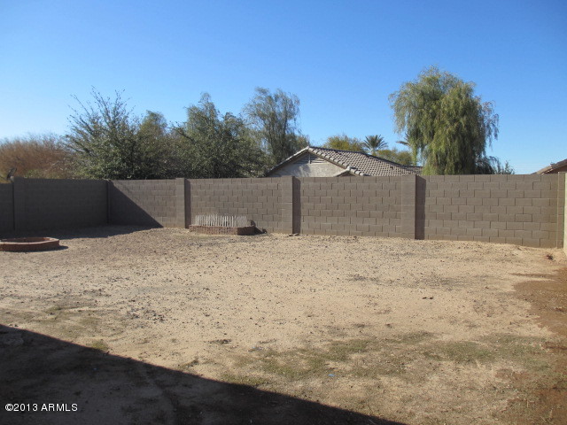 43500 West Magnolia Road Maricopa, AZ 85138 - Photo 30 of 35 a view of wooden fence next to a yard