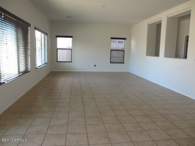 43500 West Magnolia Road Maricopa, AZ 85138 - Photo 9 of 35 a view of an empty room with a window