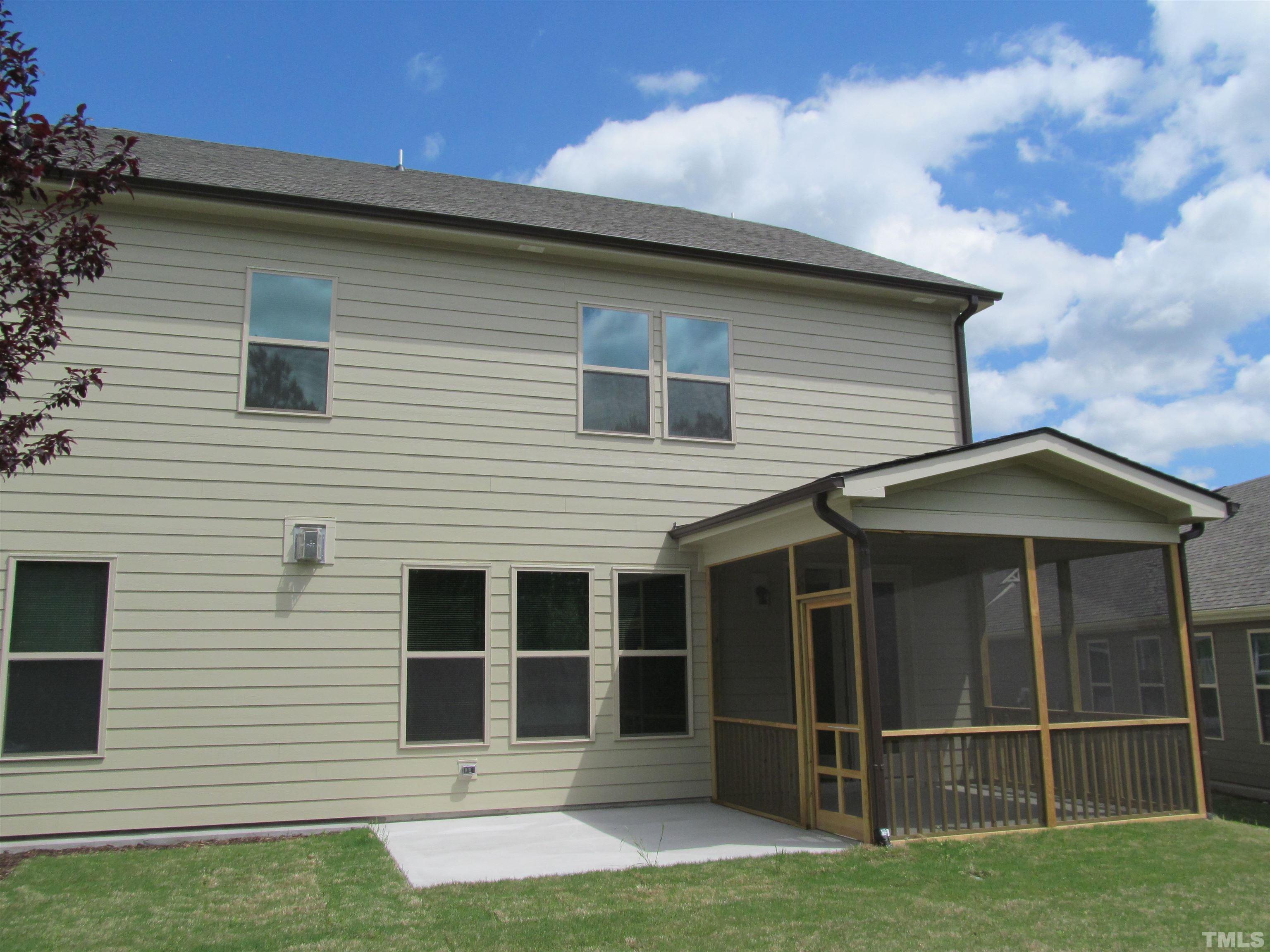 1248 Magic Hollow Road Durham, NC 27713 - Photo 12 of 13 a view of front of a house with a yard