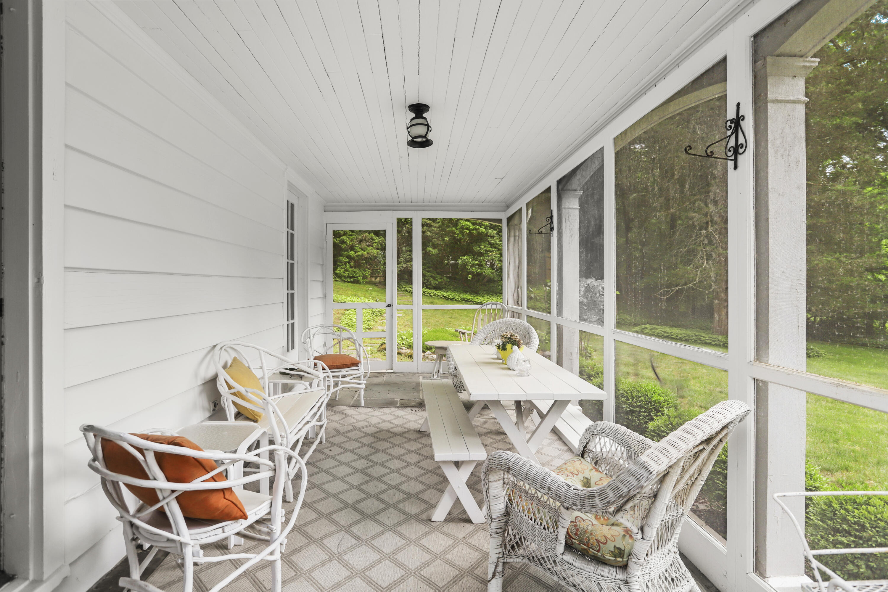165 Colonial Road New Canaan, CT 06840 - Photo 11 of 37 a living room with furniture and a large window