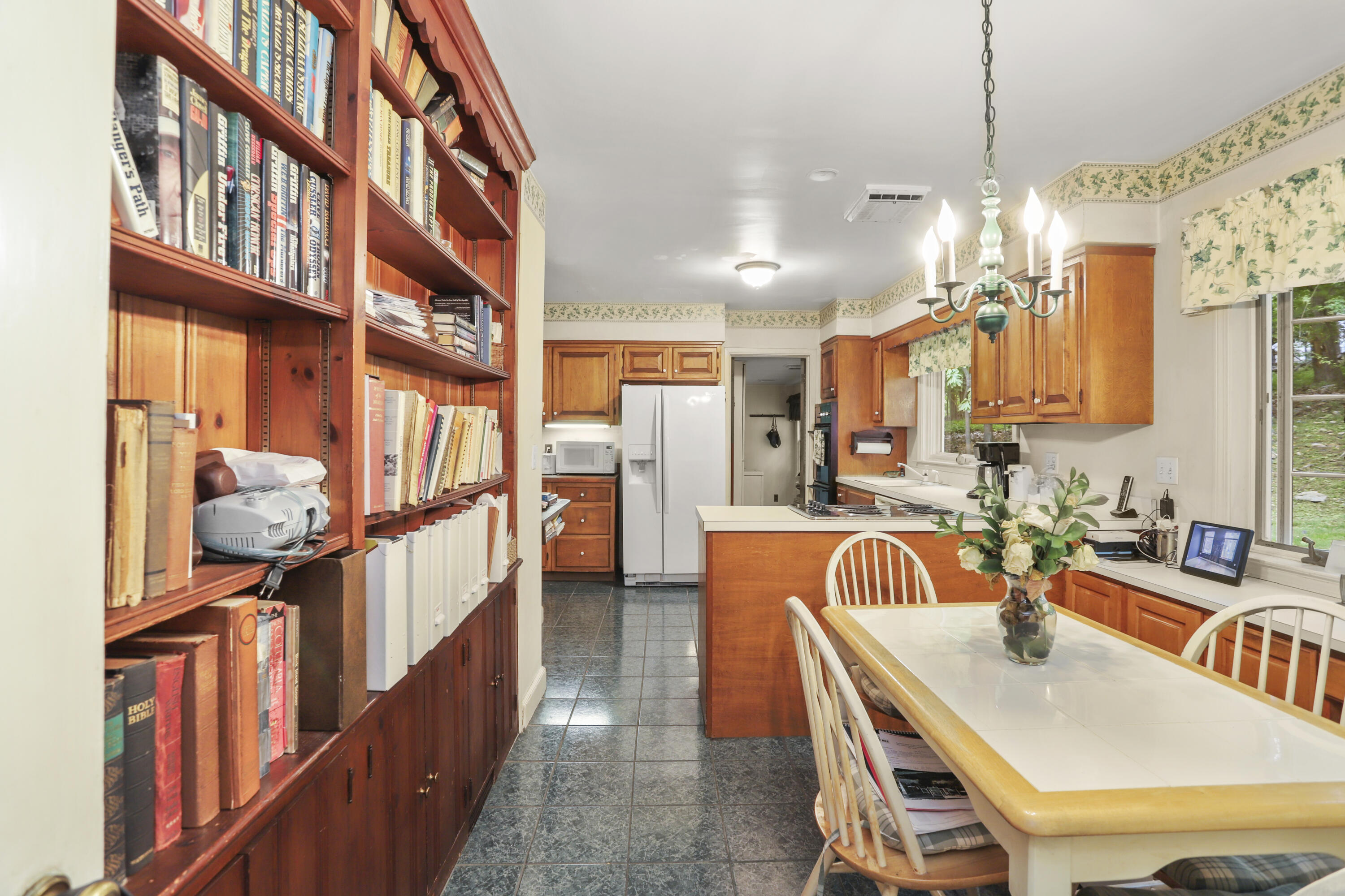 165 Colonial Road New Canaan, CT 06840 - Photo 20 of 37 a view of a kitchen and dining room