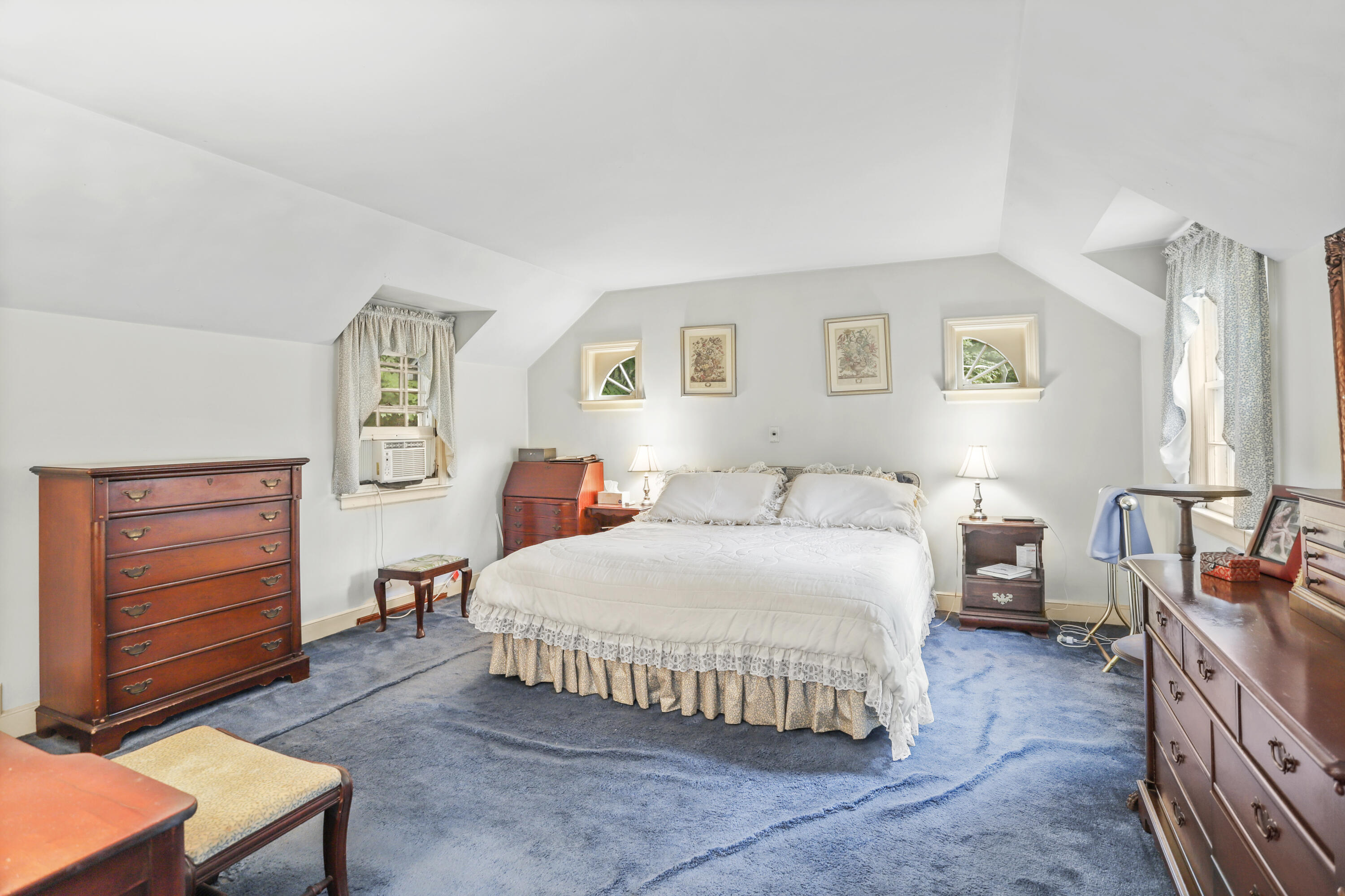 165 Colonial Road New Canaan, CT 06840 - Photo 24 of 37 a bedroom with a bed and dresser