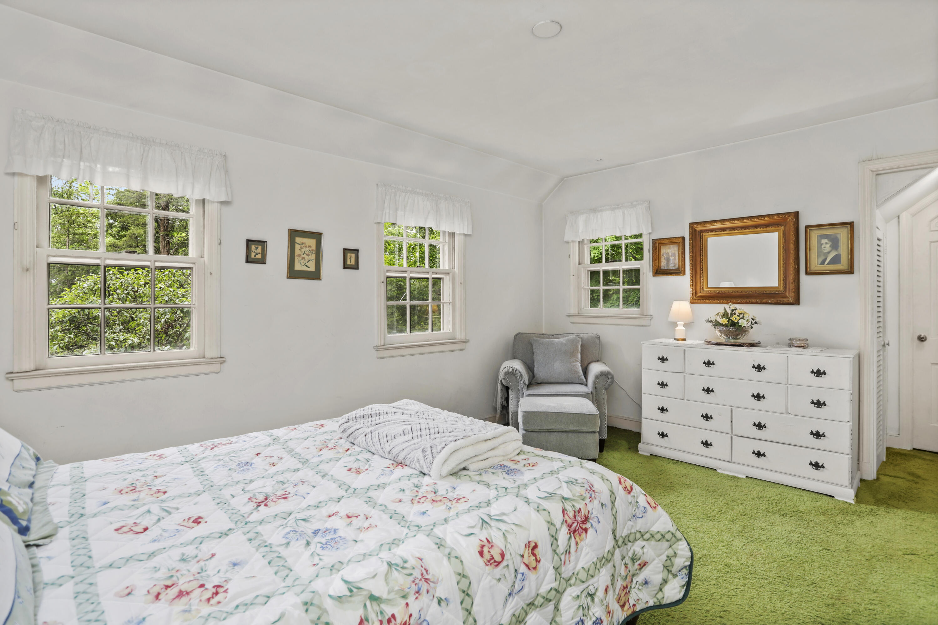 165 Colonial Road New Canaan, CT 06840 - Photo 25 of 37 a bedroom with a bed and a window