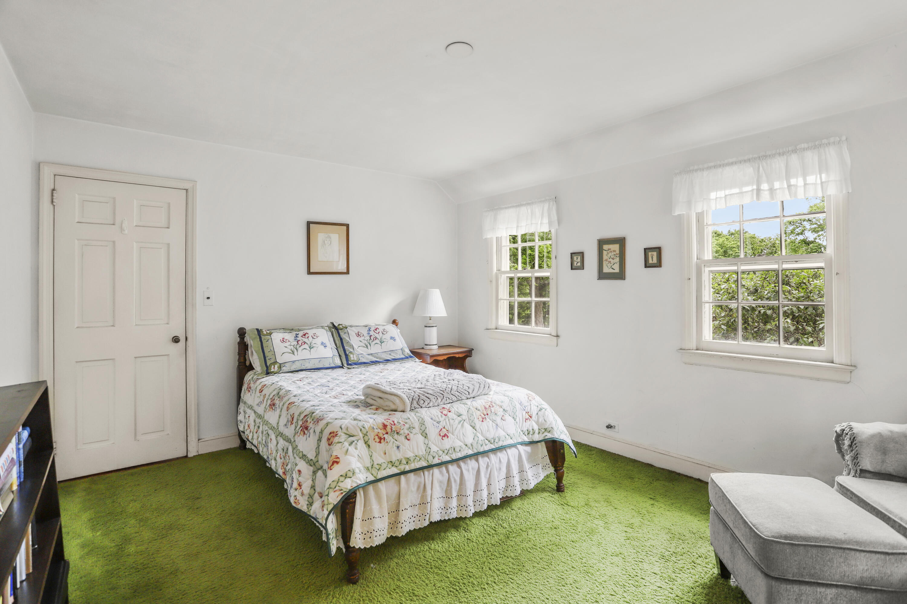 165 Colonial Road New Canaan, CT 06840 - Photo 26 of 37 a bedroom with a bed and window