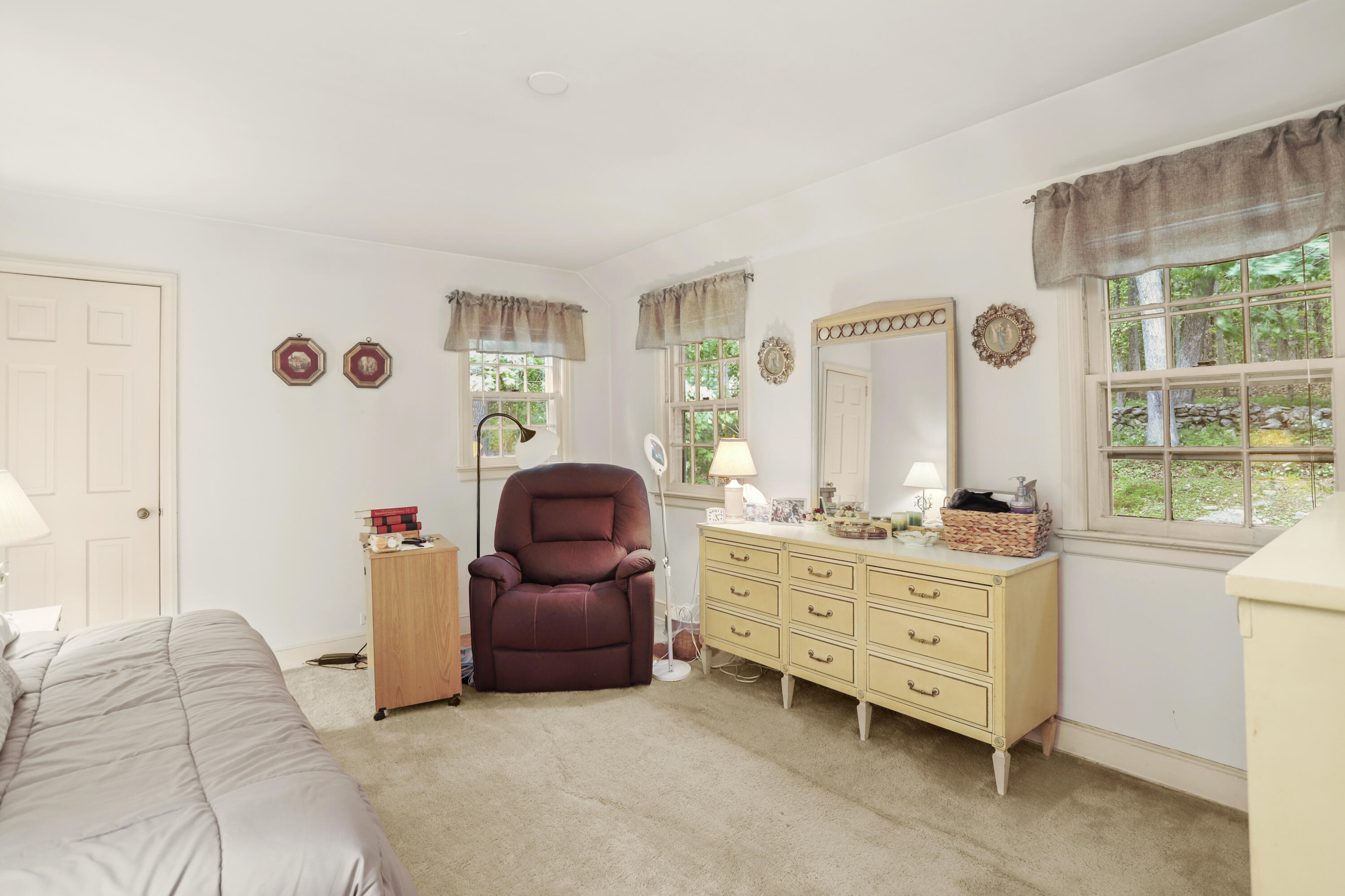 165 Colonial Road New Canaan, CT 06840 - Photo 27 of 37 a bed room with a bed and a window