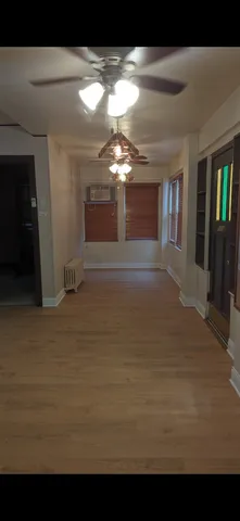 a view of a livingroom with a large window