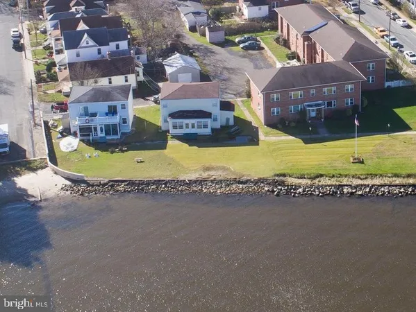 a view of a house with a ocean view