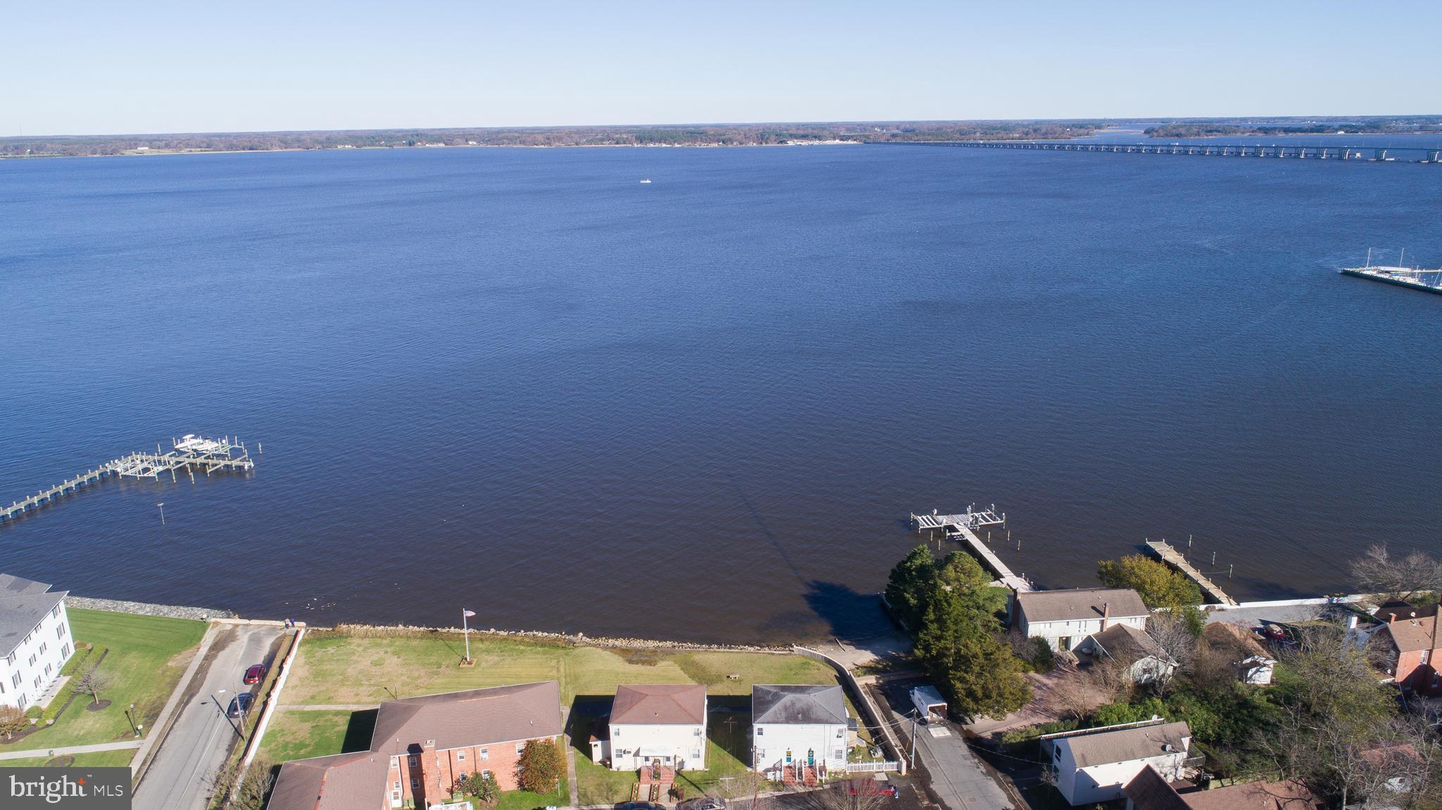 904 Oakley Terrace Cambridge, MD 21613 - Photo 6 of 30 a view of a balcony with chairs