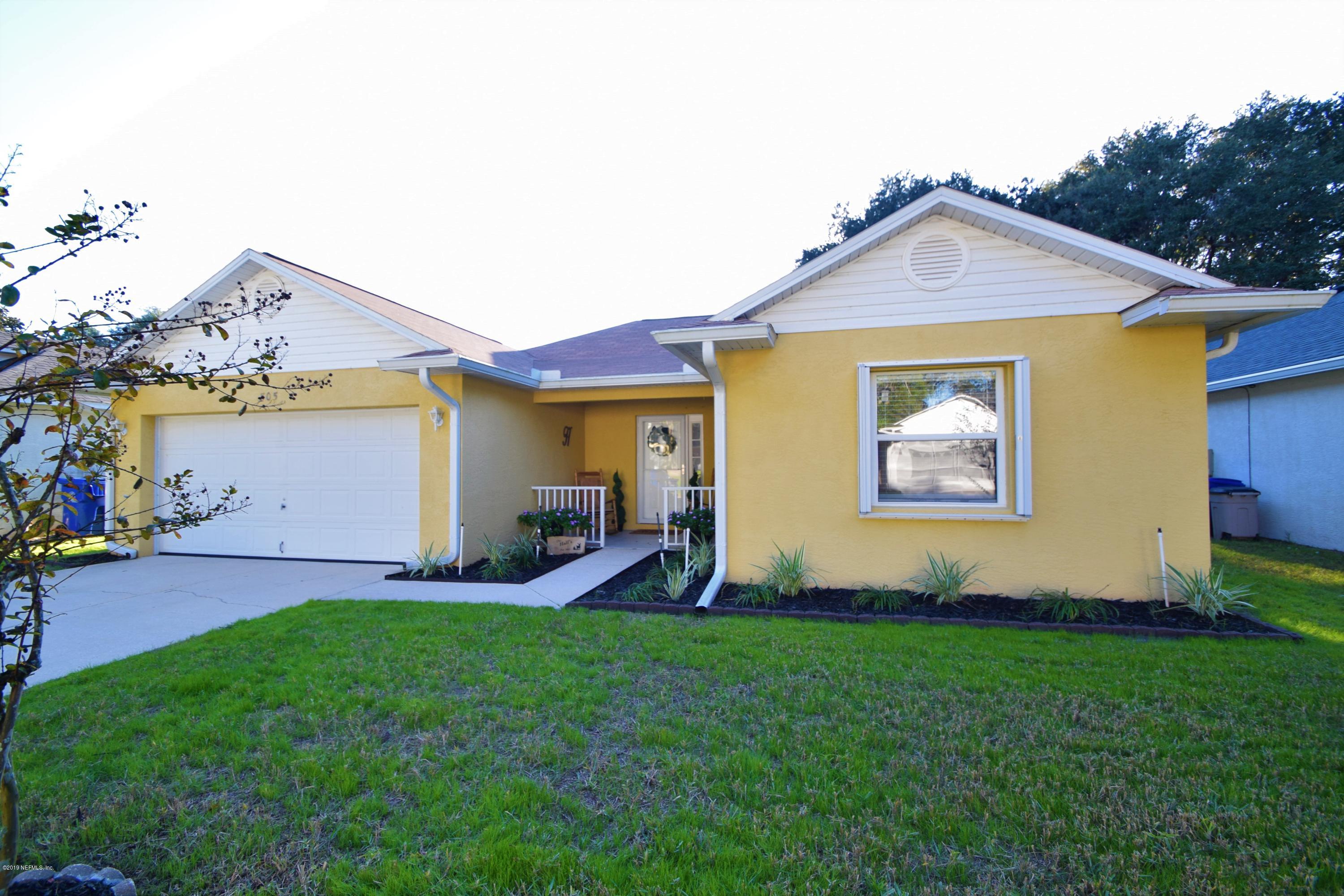 a view of outdoor space yard and garage
