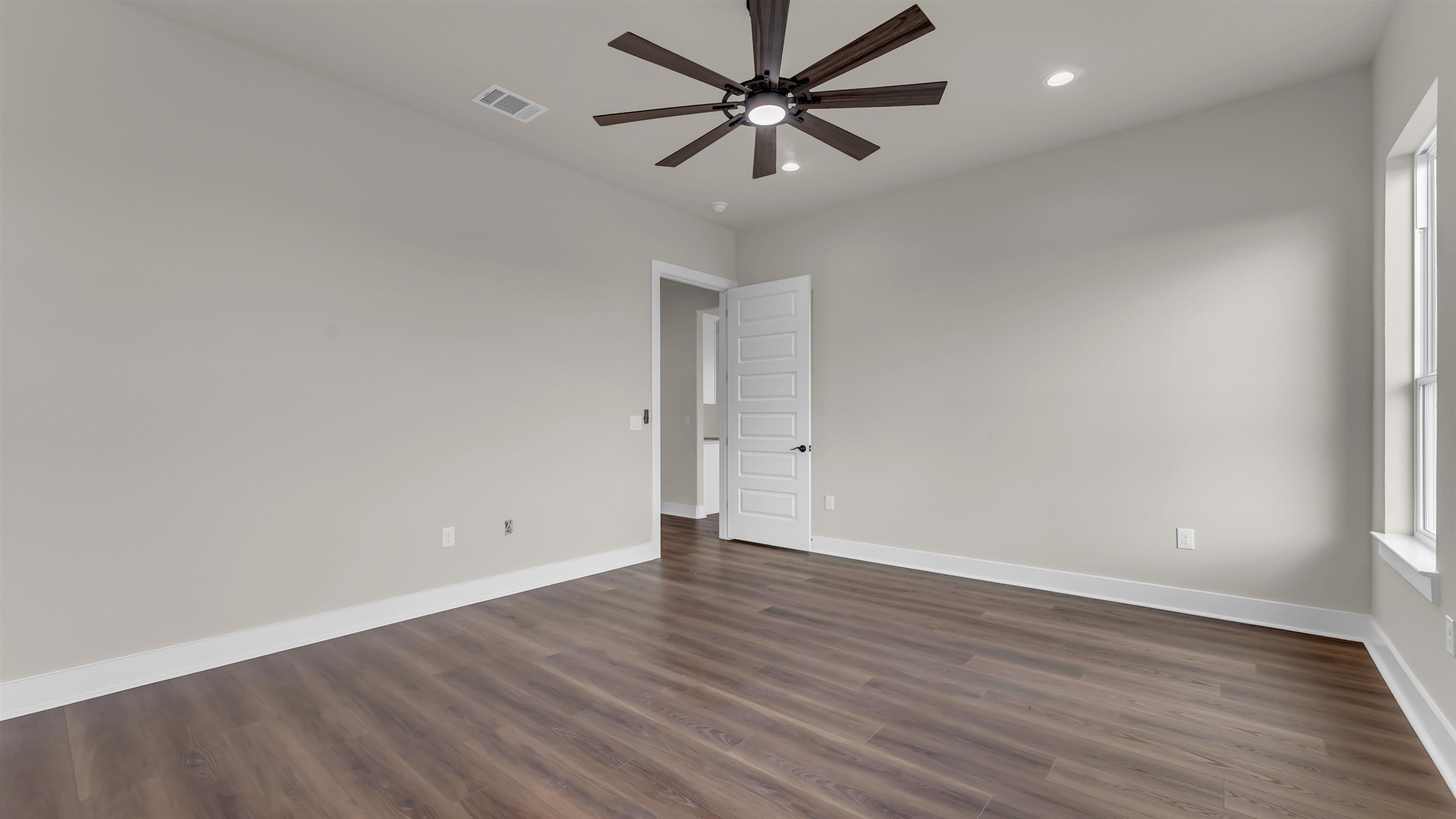 379 Prarie Point Road Bertram, TX 78605 - Photo 17 of 30 wooden floor in an empty room