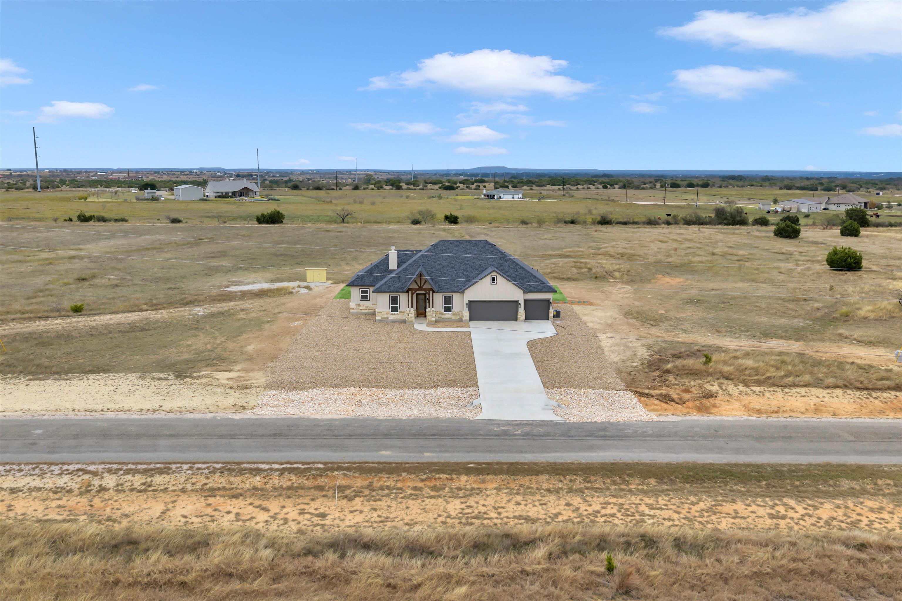 379 Prarie Point Road Bertram, TX 78605 - Photo 2 of 30 a view of an ocean and beach