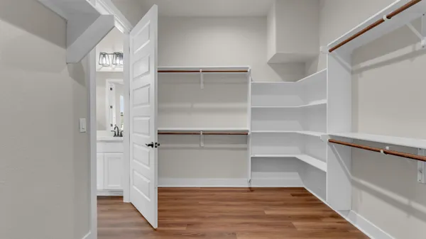 a view of an empty walk in closet