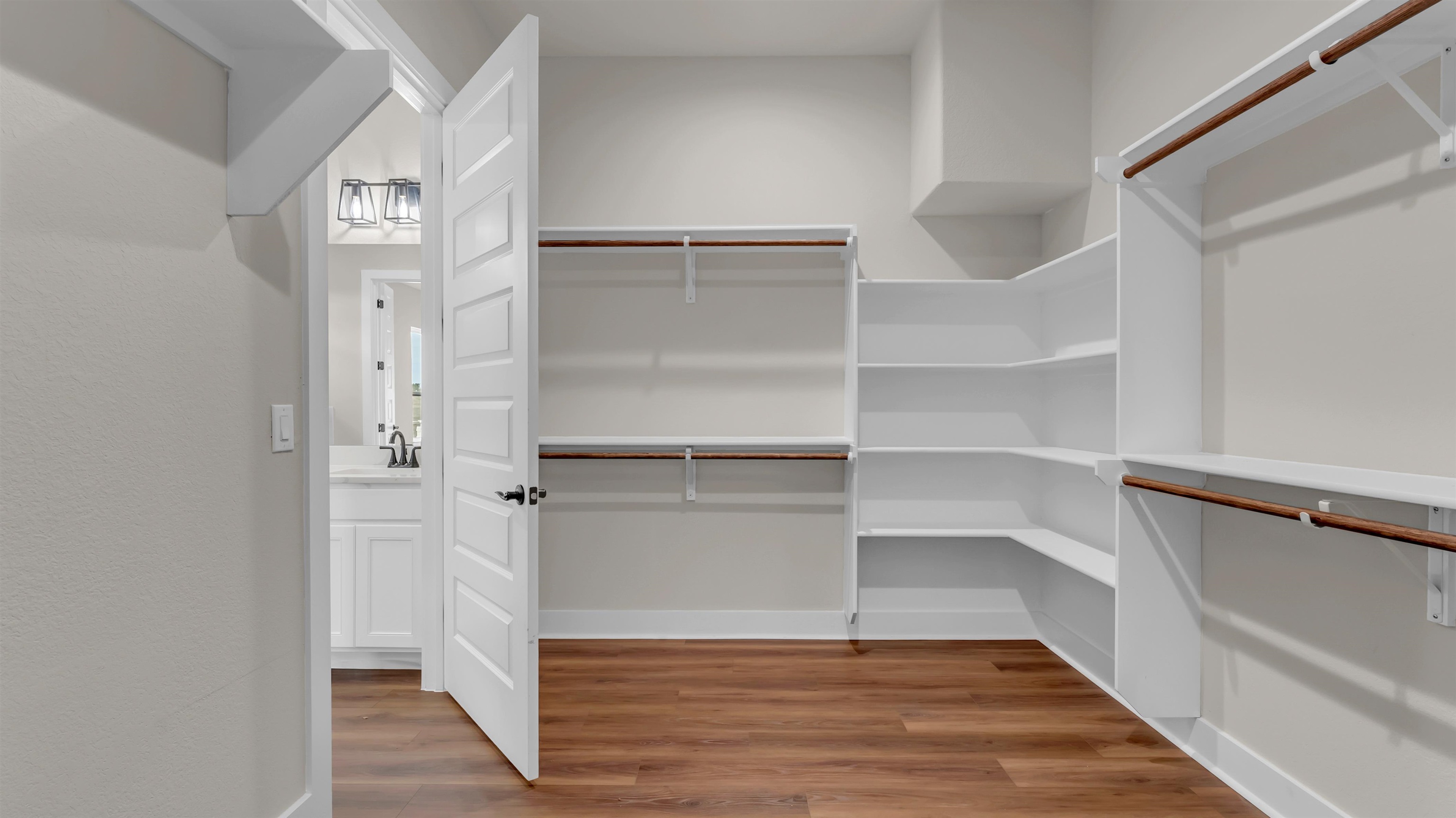 379 Prarie Point Road Bertram, TX 78605 - Photo 22 of 30 a view of walk in closet with empty racks