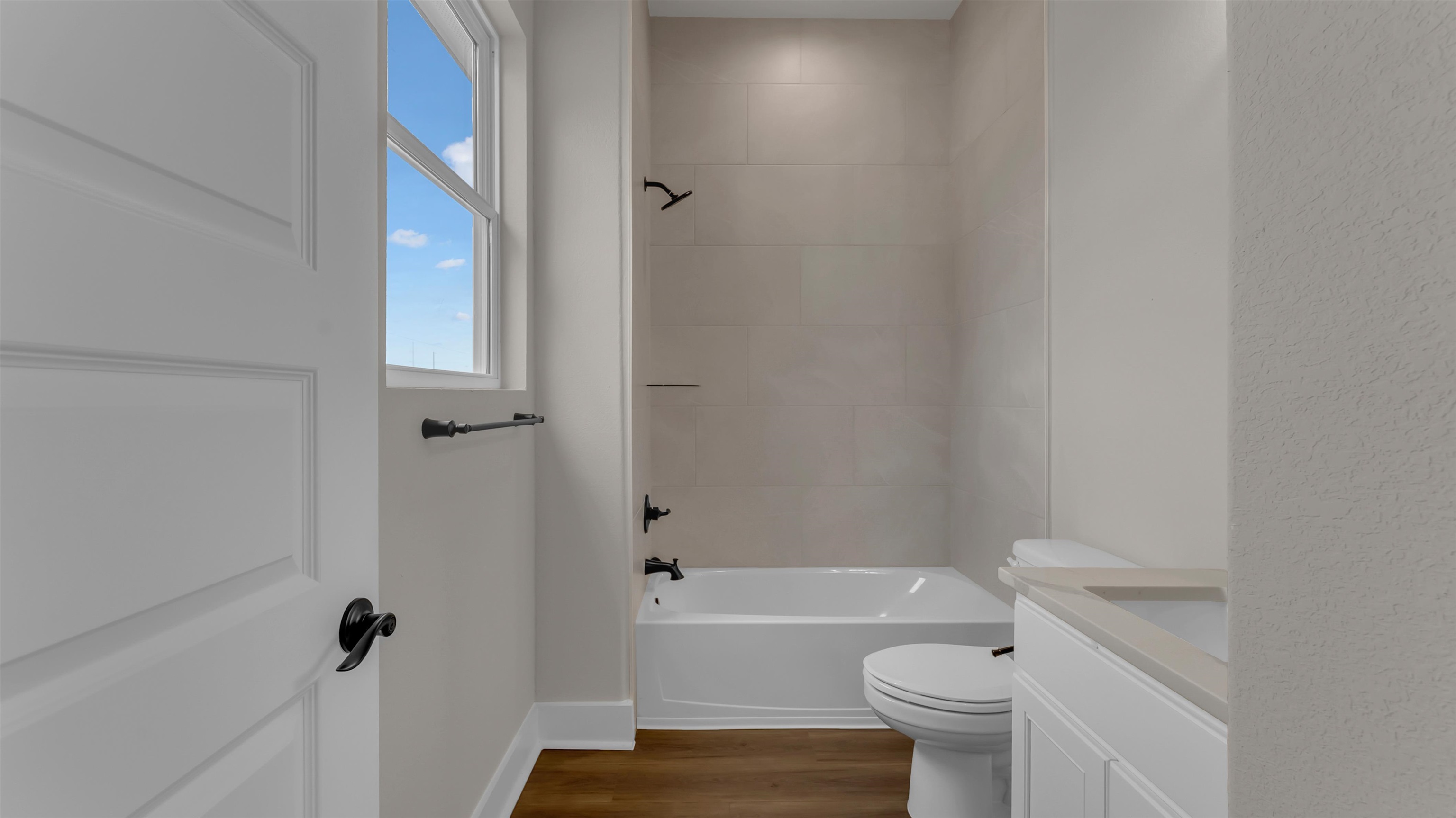 379 Prarie Point Road Bertram, TX 78605 - Photo 26 of 30 a bathroom with a toilet and a bath tub