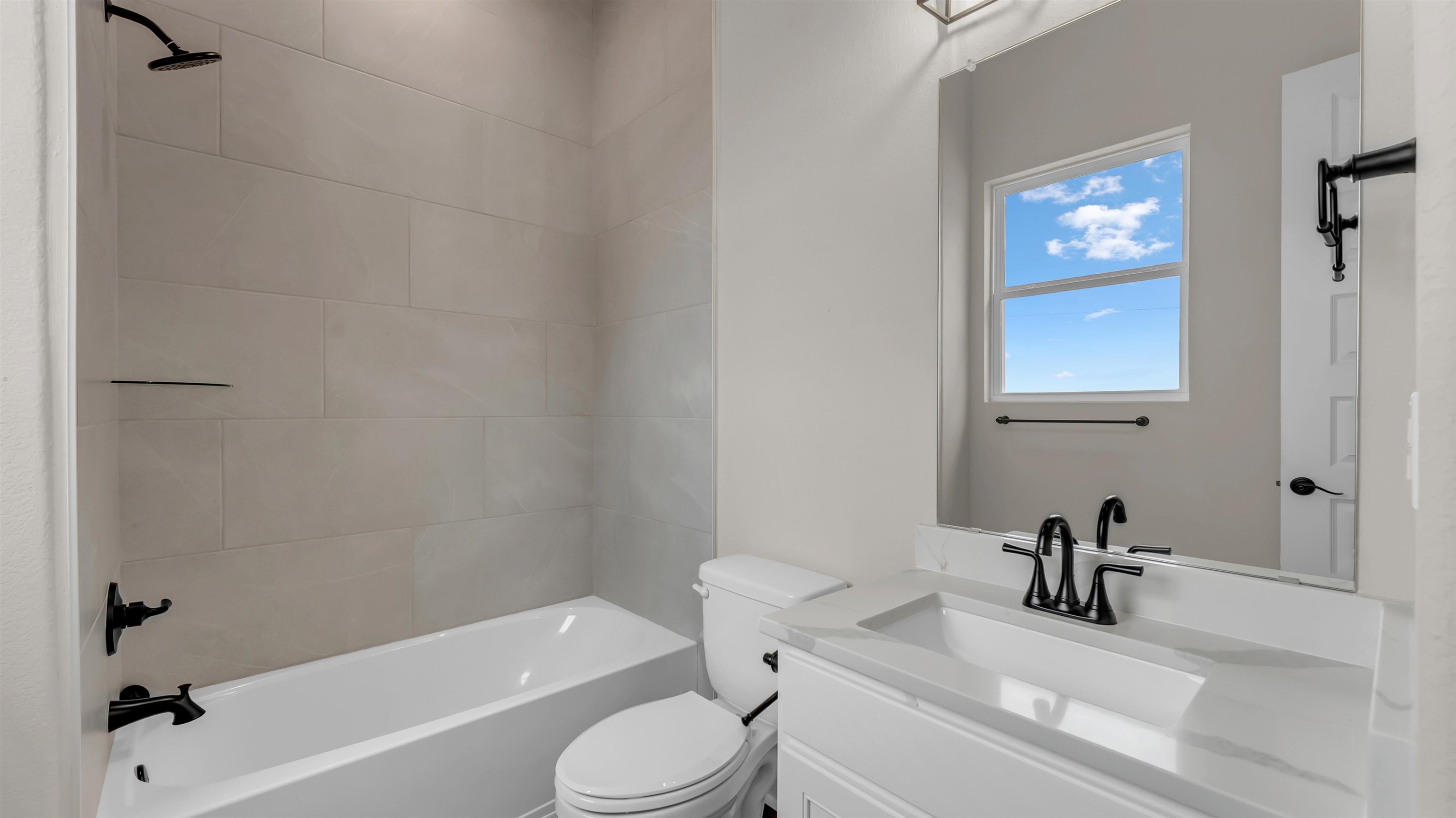 379 Prarie Point Road Bertram, TX 78605 - Photo 27 of 30 a bathroom with a sink toilet and bathtub