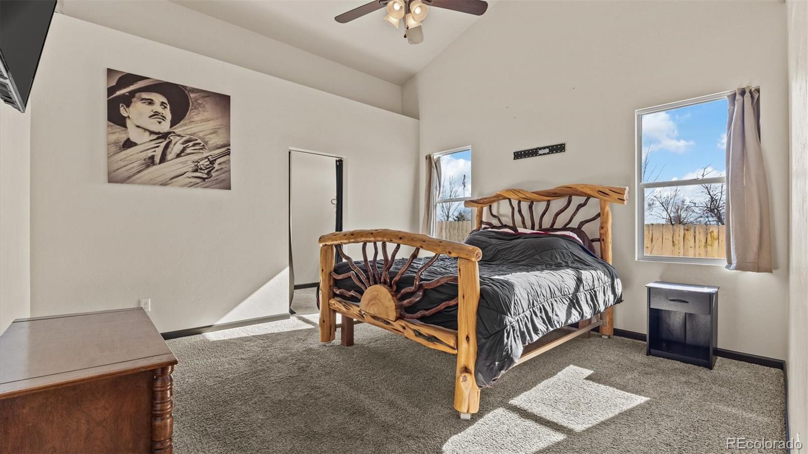 556-32 32 5/8 Road Clifton, CO 81520 - Photo 16 of 28 a bedroom with a bed and a table