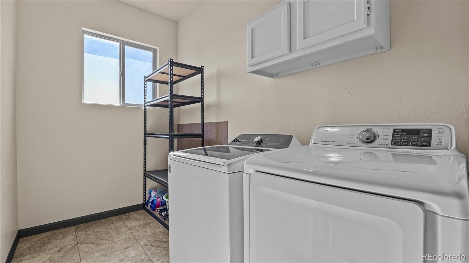 556-32 32 5/8 Road Clifton, CO 81520 - Photo 26 of 28 a utility room with dryer and washer