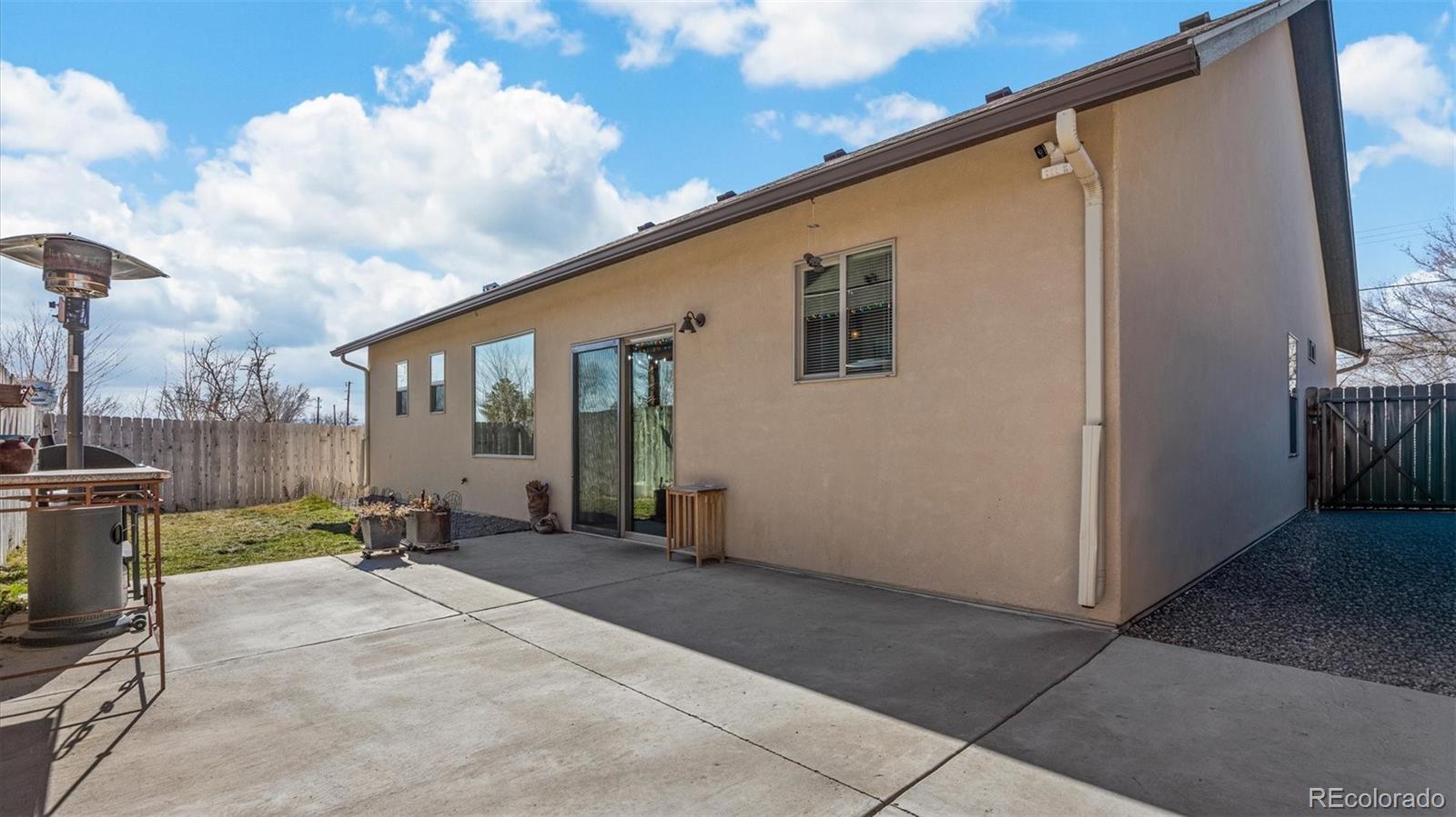 556-32 32 5/8 Road Clifton, CO 81520 - Photo 27 of 28 a backyard of a house with table and chairs